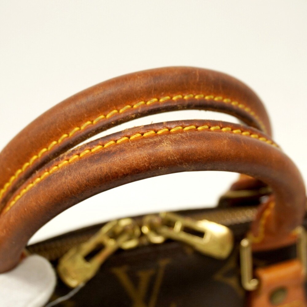 LOUIS VUITTON Authentic Brown Monogram Alma Bag - Picture 8 of 11
